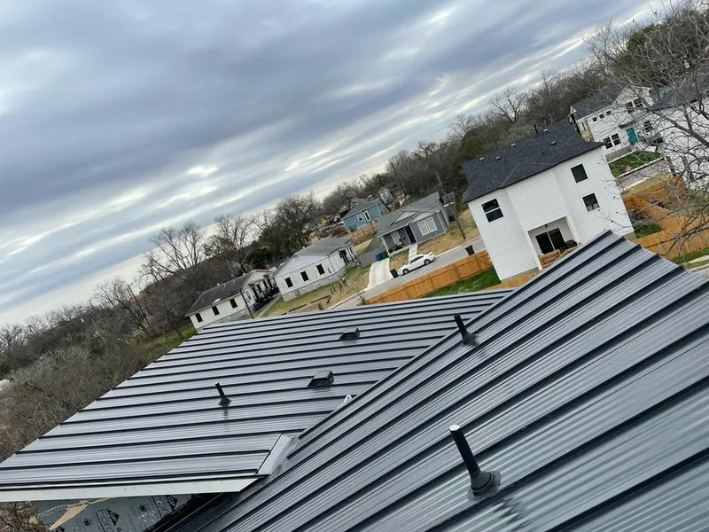 Standing seam metal roof panels with vents for Skylight Repair in Odenville